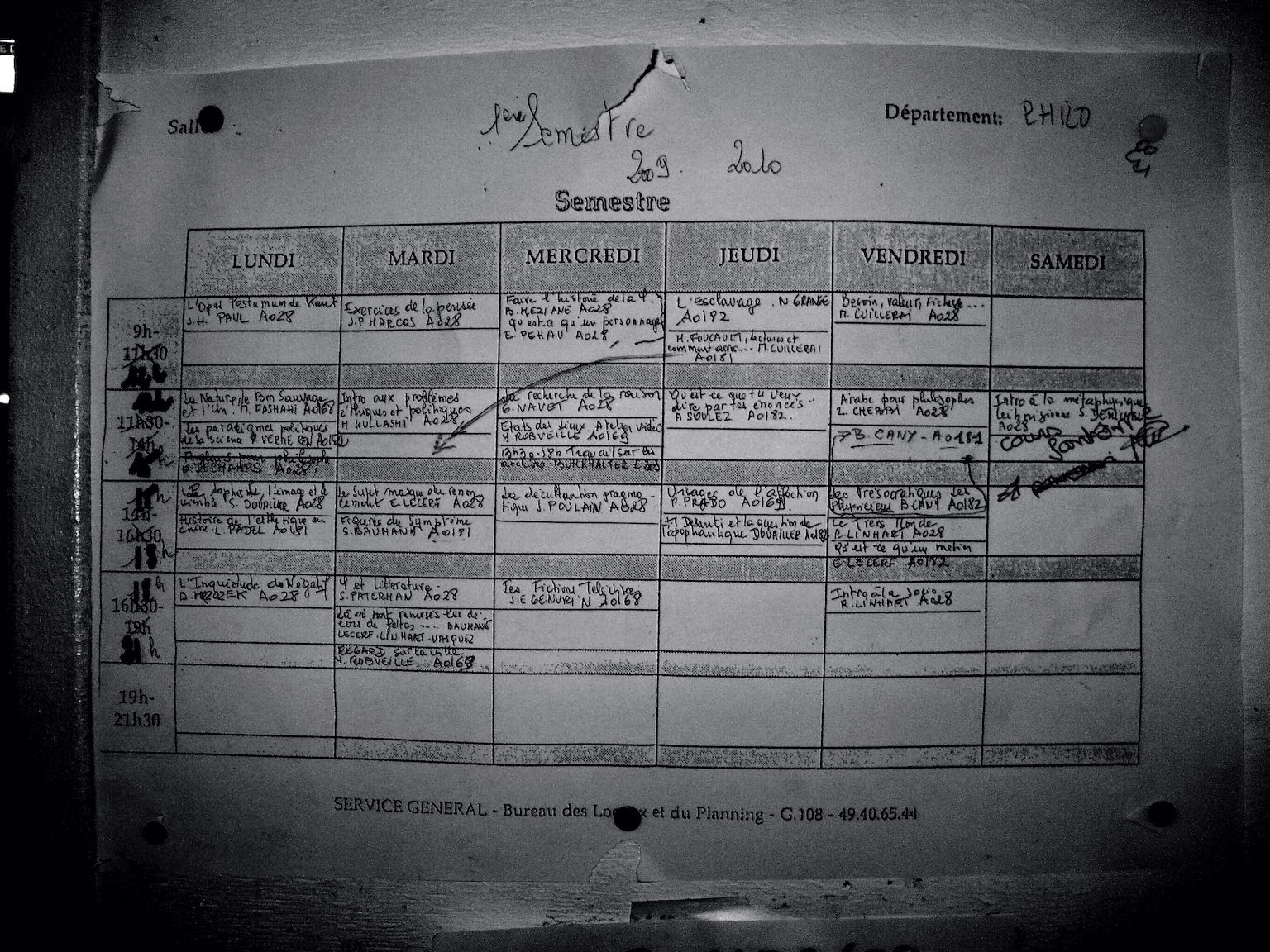 Figure 9: A handwritten course schedule posted outside the department office, November 2009.